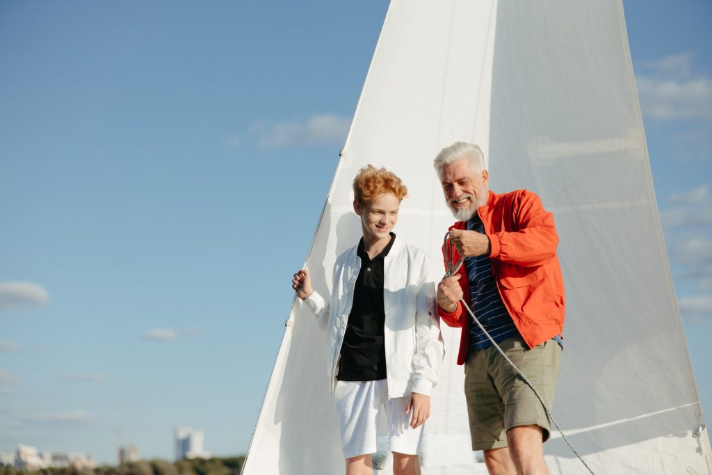 Older couple on sailing boat