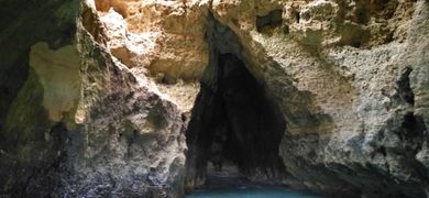The boat reaches the caves very closely