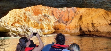 Admire hidden caves of the Algarve