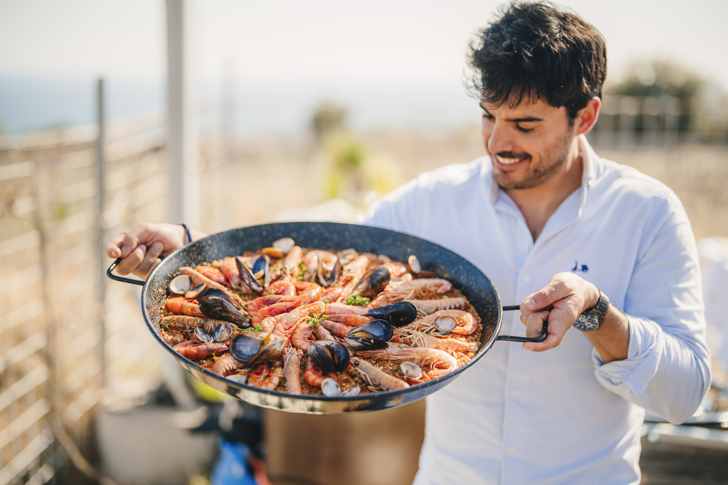 Paella cooking, Winery tour and Sailing in Barcelona