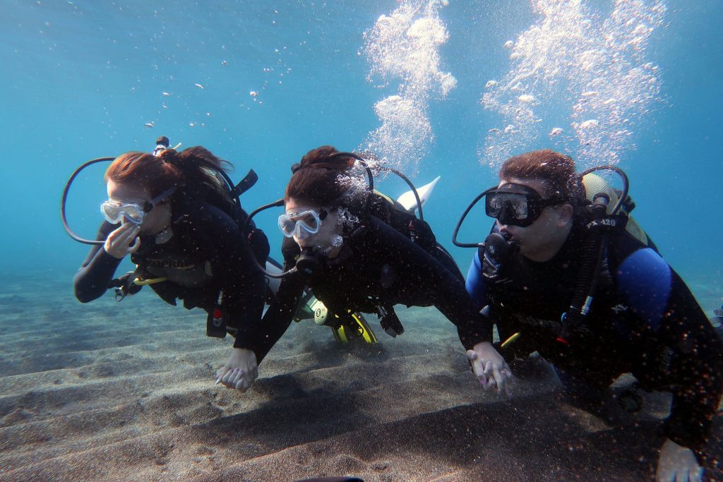 You'll be guided by an instructor while scuba diving Santorini