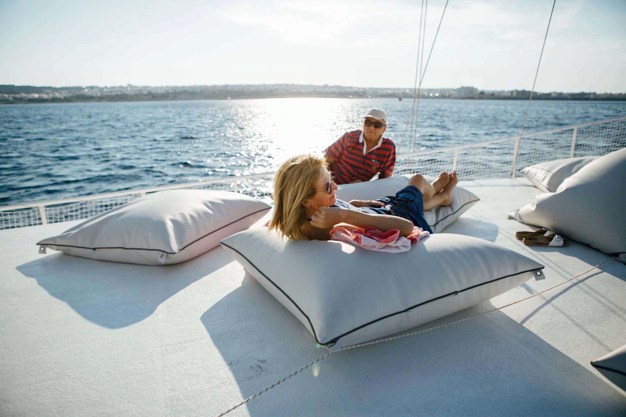 Relax on board of our sailing boat for this Rhodes tour during sunset