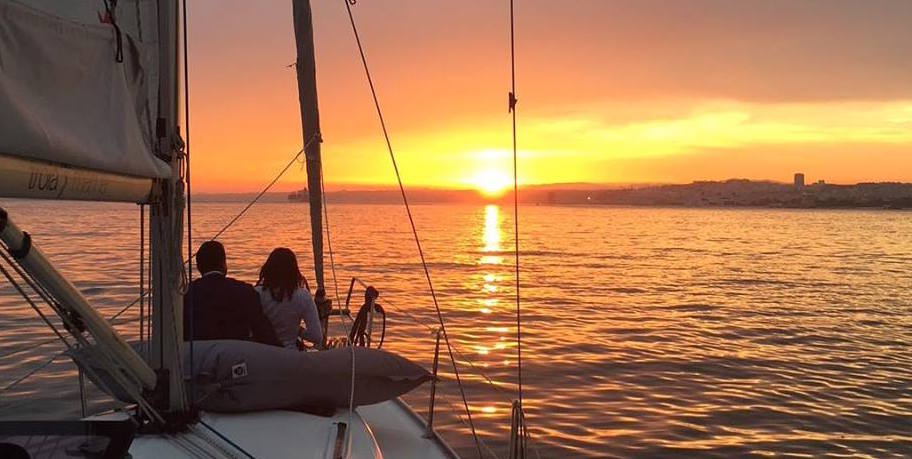 Romantic sunset sailing in Lisbon cover