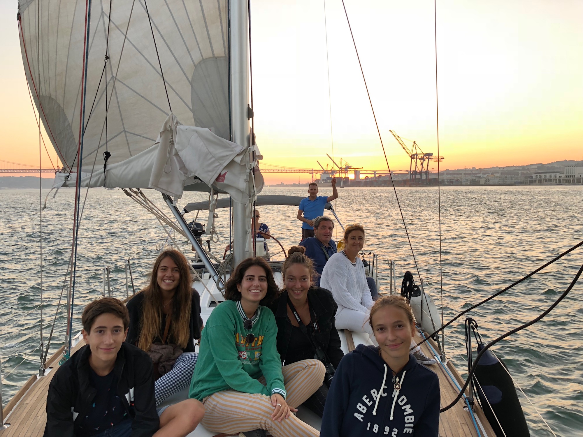 Lisbon sunset sailing boat