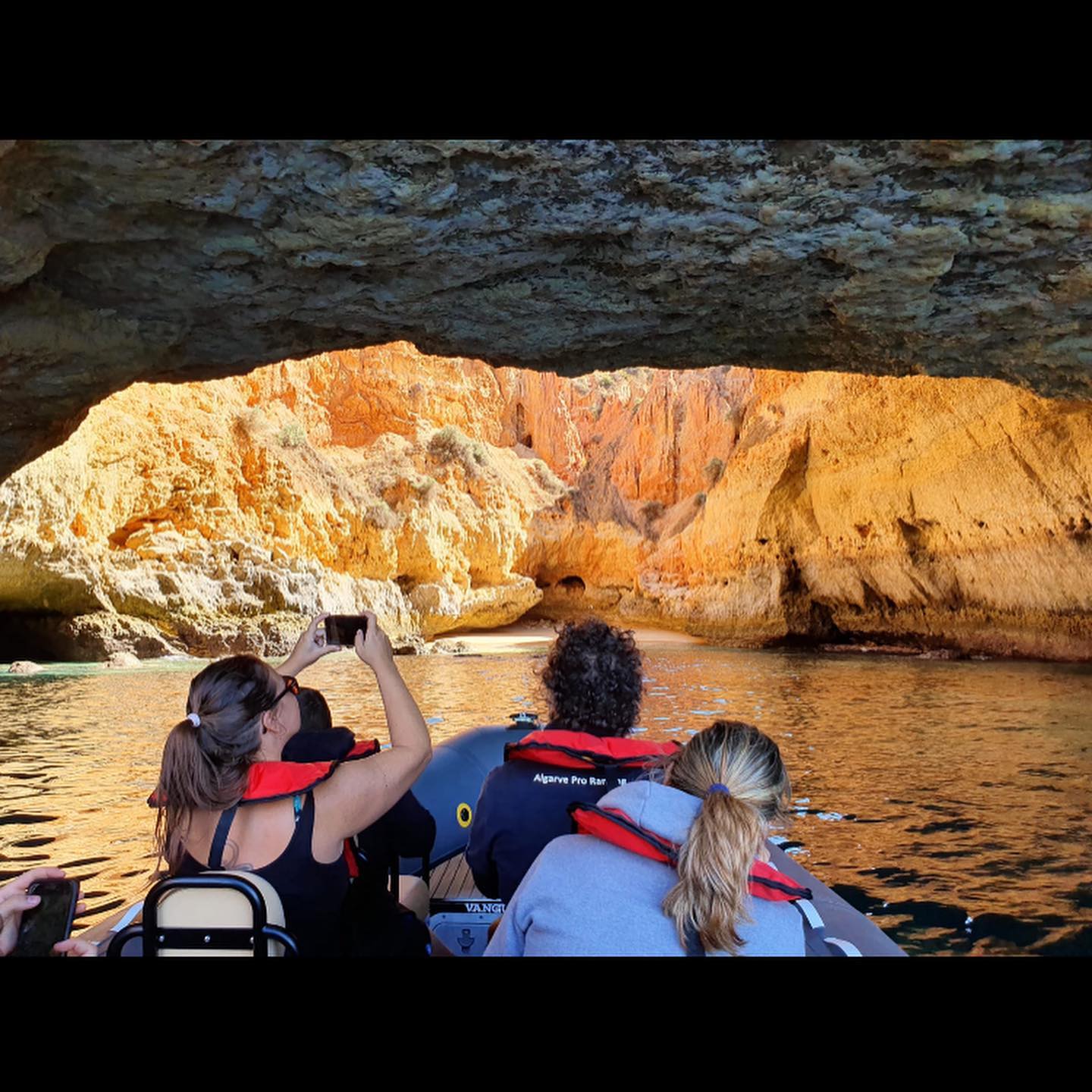 Admire hidden caves of the Algarve