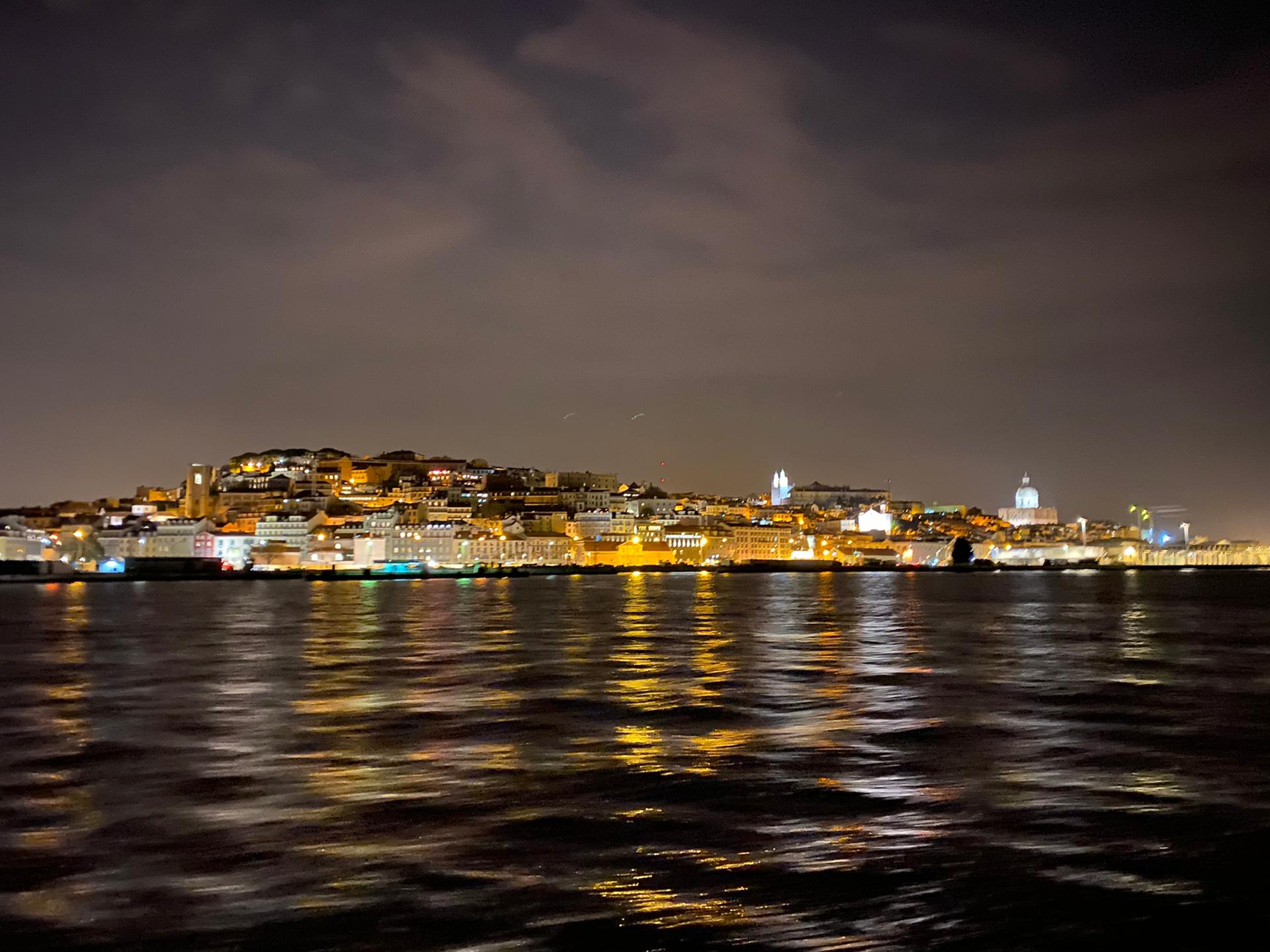 Lisbon's hills by night from the River