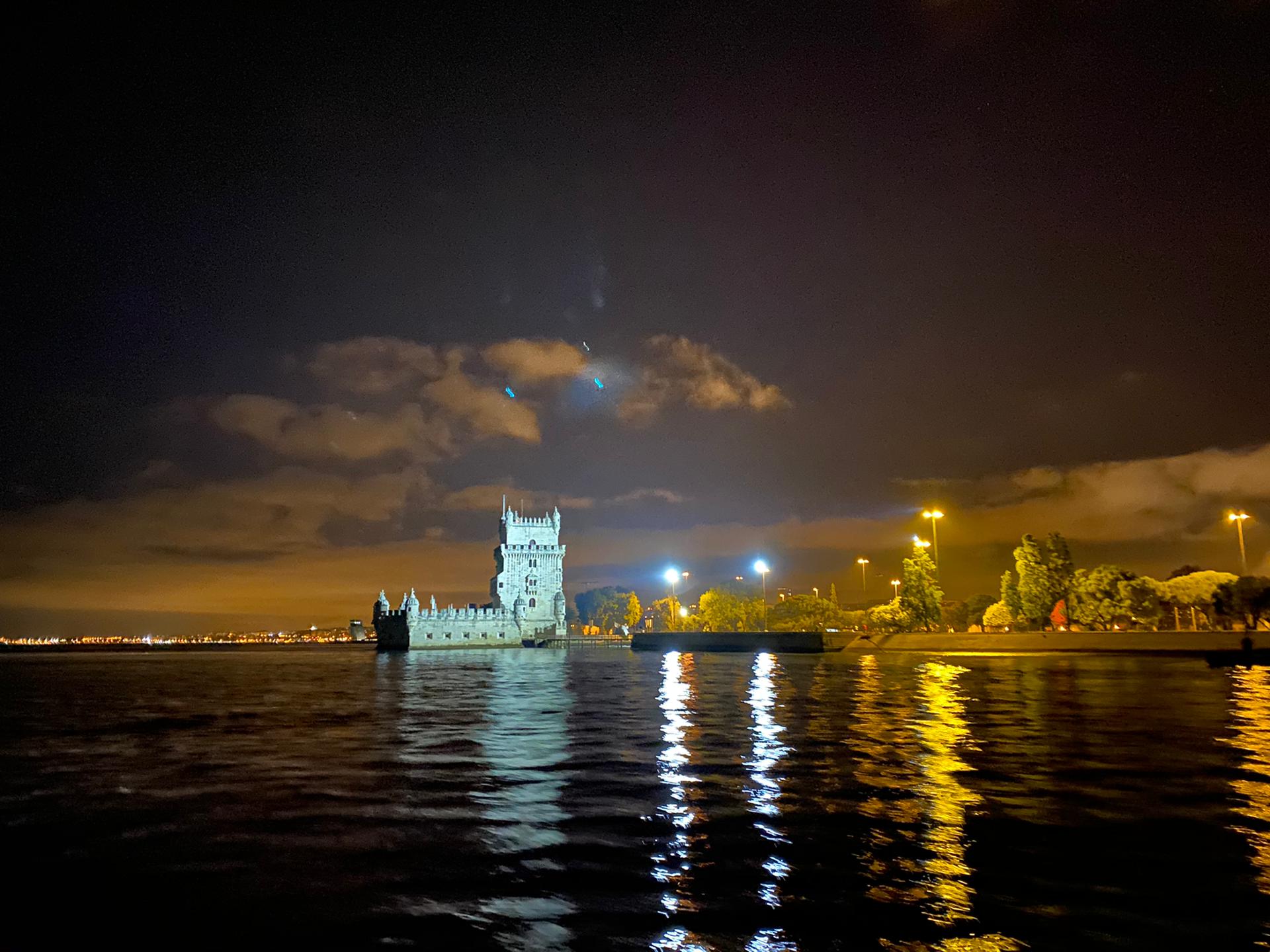 Belém Tower night sailing in Lisbon