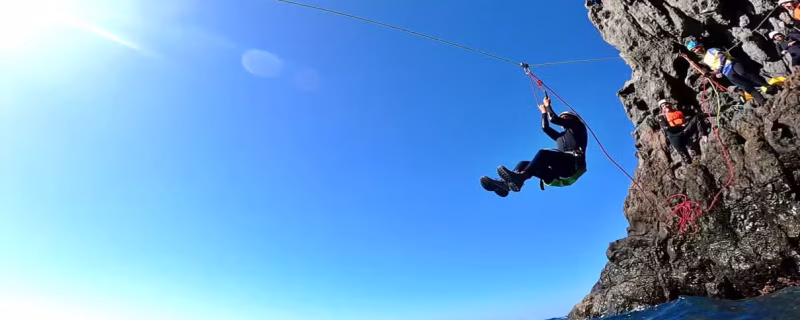 Sliding during Coasteering in Gran Canaria