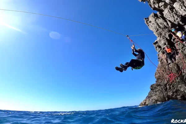 Sliding during Coasteering in Gran Canaria