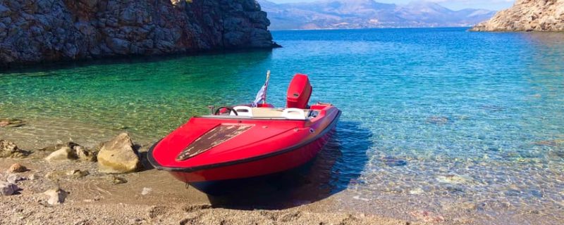 Red speedboat in Mirabello Bay