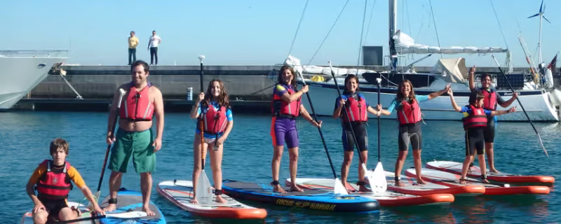 Group of friends on SUP boards in Oeiras, close to Lisbon