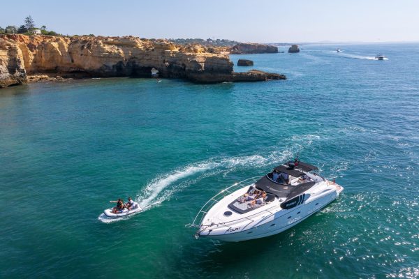 Yacht cruising along the Algarve coast