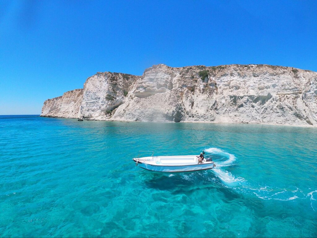 white boat on a water